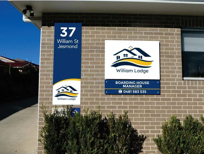 William Lodge building signage at 37 William Street Jesmond showing the Boarding House Manager phone number, with a CCTV camera visible